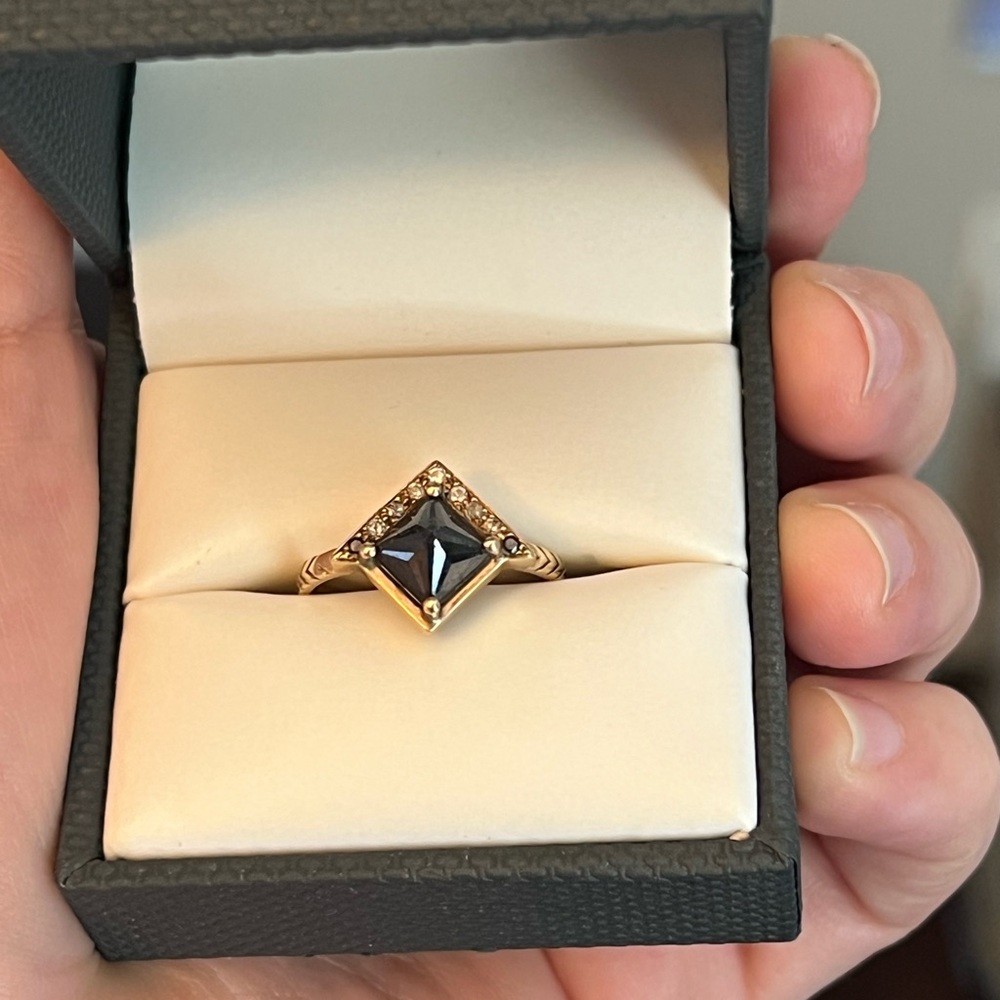 Elegant Black and Gold Ring